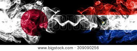 Japan Vs Paraguay, Paraguayan Smoky Mystic Flags Placed Side By Side. Thick Colored Silky Smokes Com