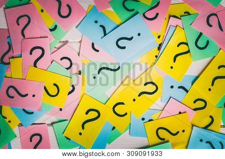 Colorful Paper Notes With Question Marks. Closeup