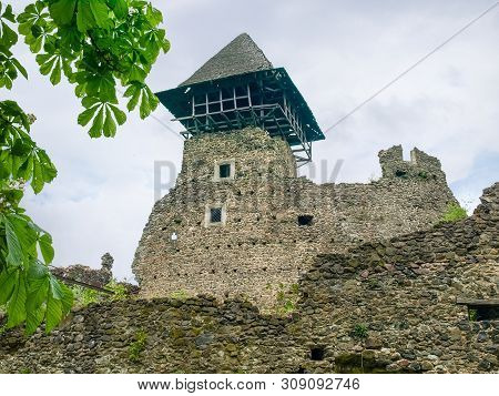 Picturesque Ruins Of Ancient Stone Nevytske Castle Of The 13-17th Centuries. Main Tower-donjon And P