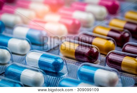 Selective Focus On Blue-white Capsule Pills In Blister Pack. Pharmaceutical Industry. Drug Package. 