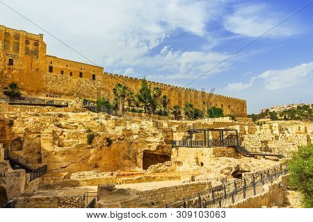The Fortress Wall Of Ancient Jerusalem With Archaeological Excavations Of Ancient Buildings