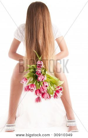 Flores e pernas de mulher
