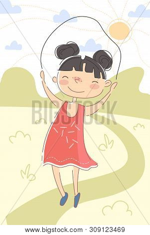 Happy Little Girl Jumping Over A Skipping Rope