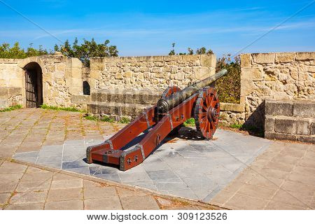 Cannon And Mota Castle Walls On Monte Urgull Mountain In San Sebastian Or Donostia City In Spain