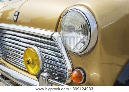 Novi Sad, Serbia, May 19, 2019: Detail Of A Left Front Light Of An Classic Racing Mini Cooper Detail