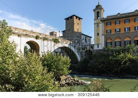 Rome, Italy - June 22, 2017: Amazing View Of Tiber River And Pons Fabricius In City Of Rome, Italy
