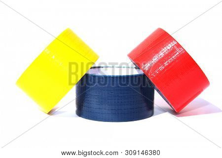 duct tape. yellow, blue, red duct tape rolls. isolated on white. room for text. 