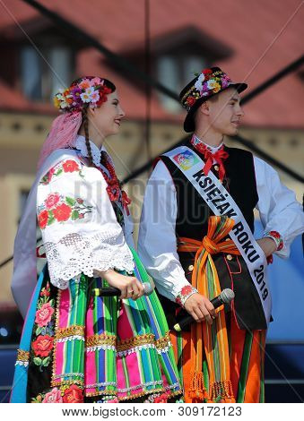 Lowicz / Poland - June 20 2019: Young Girl And Boy In Traditional Folk Costumes From Lowicz Region I