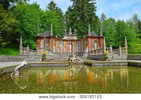 Salzburg, Austria - May 25, 2019 : Trick Fountains And Sculptures At The  Public Gardens Of Hellbrun