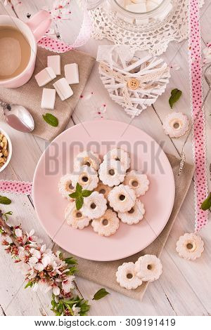 Canestrelli Biscuits With Icign Sugar On Wooden Table.