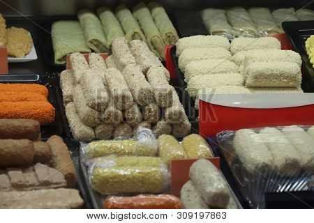 Various Sorts Of Raw Snacks On Display In A Fast Food Restaurant