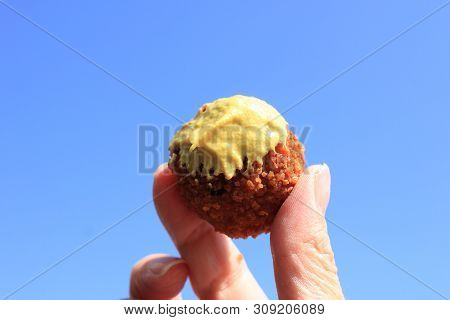 Dutch Bitterbal Warm Stuffed Fried Meatbal, Served In The Netherlands With Mustard