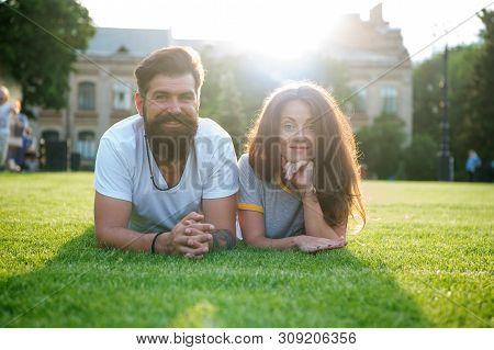 Adding Some Romance. Holiday Romance Of Bearded Man And Sexy Woman. Couple In Love Relaxing On Green