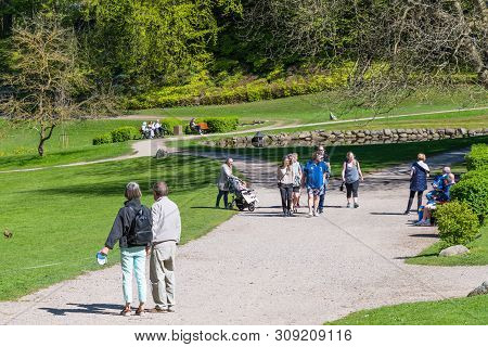 Liselund Denmark - May 5. 2018: People Walking In The Park At Liselund Palace In Denmark On A Sunny 