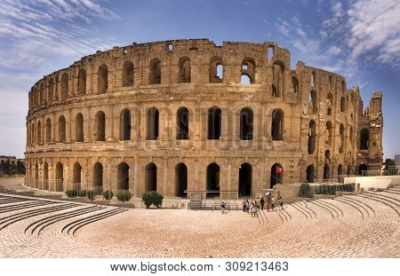 Amphitheatre Of El Jem Tunisia 25 May 2012. A Listed World Heritage Site Is The Best Preserved And I