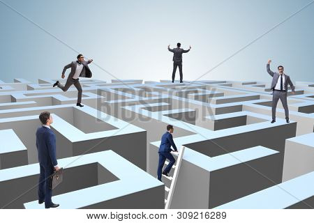 Businessman trying to escape from maze 