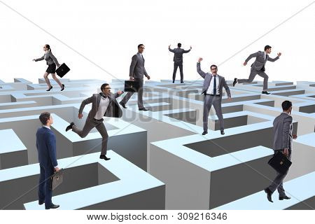 Business people trying to escape from maze