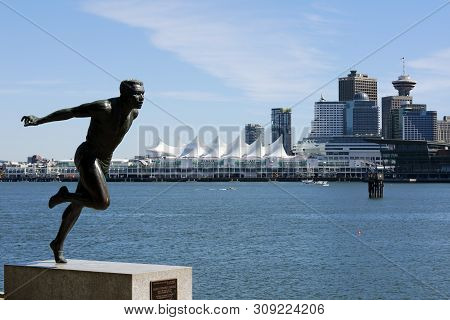 Vancouver City, Bc Canada - Jun 11, 2019: The Bronze Statue Of The Famous Canadian Athlete Harry Jer