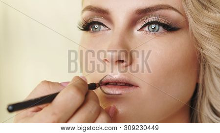 Master Class Makeup Art Shows On Model. Technique Of Applying Lipstick, Perfect Lips. Trendy Lip Col