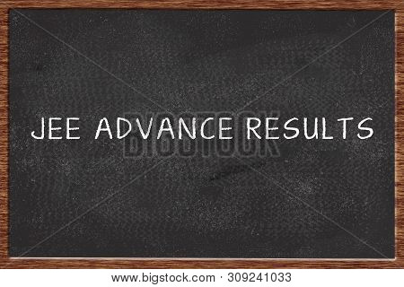 Jee Advanced Results Written On Black Chalk Board.