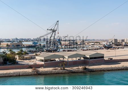 Suez, Egypt - November 5, 2017: Industrial Port Infrastructure Objects On The Shore Of Suez Canal In