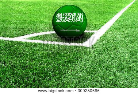 Soccer Ball On A Green Field, Flag Of Saudi Arabia