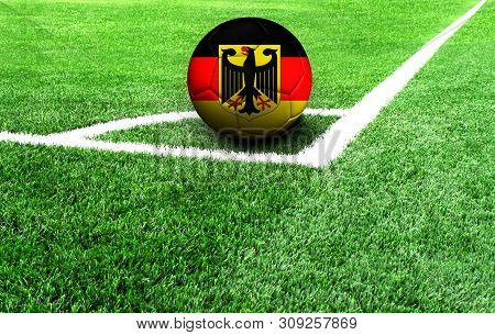 Soccer Ball On A Green Field, Flag Of Germany