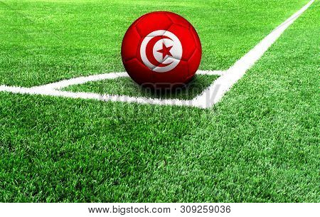 Soccer Ball On A Green Field, Flag Of Tunisia