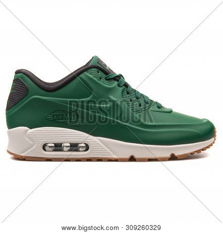 Vienna, Austria - August 25, 2017: Nike Air Max 90 Vt Qs Green And Black Sneaker On White Background