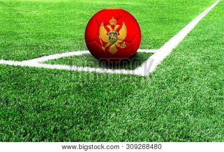 Soccer Ball On A Green Field, Flag Of Montenegro