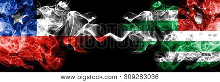 Chile Vs Abkhazia, Abkhazian Smoky Mystic Flags Placed Side By Side. Thick Colored Silky Smokes Comb