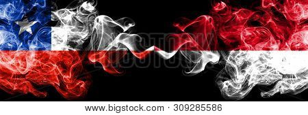 Chile Vs Monaco, Monacan Smoky Mystic Flags Placed Side By Side. Thick Colored Silky Smokes Combinat
