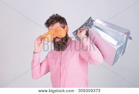Shopping Addicted Consumer. How To Get Ready For Your Next Vacation. Man Bearded Hipster Wear Sungla