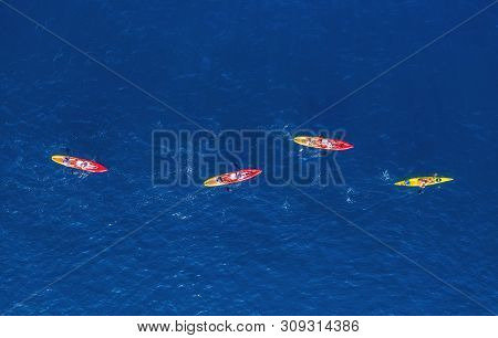 Croatia. Kayks At The Sea Surface. Aerial View Of Kyaks On Blue Adriatic Sea At Sunny Day. Adventure