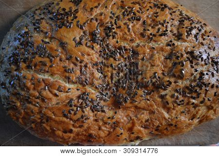 Beautiful Very Hearty Bread Homemade Recipe. Brown Bread With Crispy Crust, Black Caraway Seeds And 