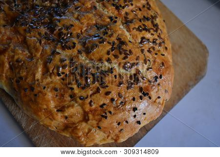 Beautiful Very Hearty Bread Homemade Recipe. Brown Bread With Crispy Crust, Black Caraway Seeds And 