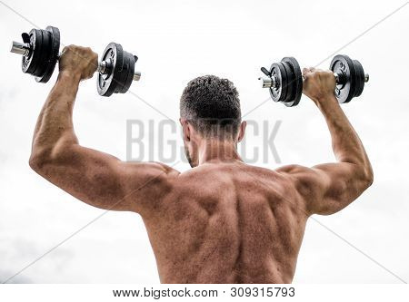 Full Of Energy. Man Sportsman Weightlifting. Steroids. Fitness And Sport Equipment. Muscular Back Ma