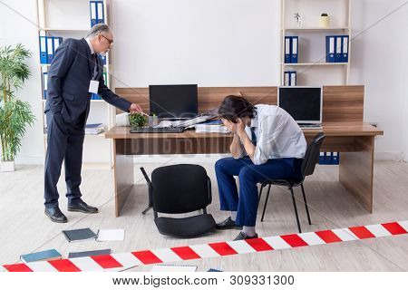 Forensic investigator investigating theft in the office