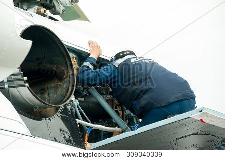 Tyumen, Russia - June 19, 2019: Aircraft Repair Helicopter Utair Engineering Plant. Male Mechanic In