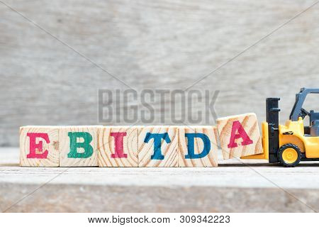 Toy Forklift Hold Letter Block A To Complete Word Ebitda (abbreviation Of Earnings Before Interest, 