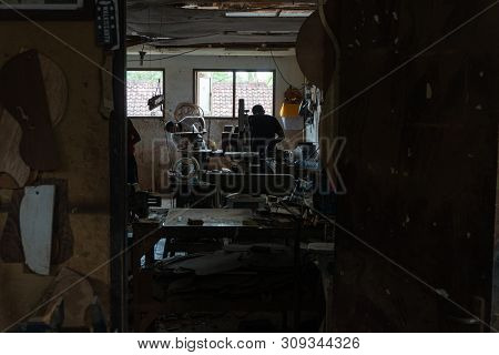 Gianyar,bali/indonesia-may 30 2019: The Guitar Craftsmen Are Working On Making Guitars In A Classica
