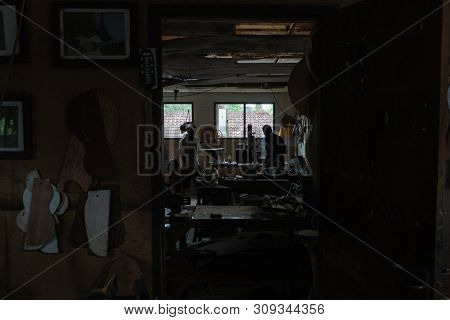 Gianyar,bali/indonesia-may 30 2019: The Guitar Craftsmen Are Working On Making Guitars In A Classica