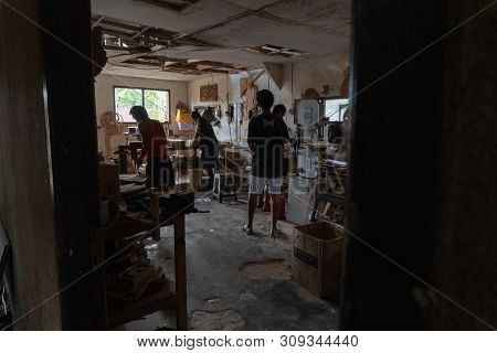 Gianyar,bali/indonesia-may 30 2019: The Guitar Craftsmen Are Working On Making Guitars In A Classica