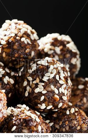 Raw Homemade Paleo Energy Balls With Rolled Oats, Nuts, Dates And Sesame, Horizontal, Close Up. Vega