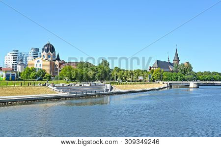 Kaliningrad, Russia - June 18, 2019: General Karbyshev Embankment, Pregolya River, New Liberal Synag