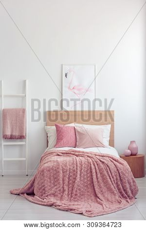 Pastel Pink Pillow And Blanket On Single Wooden Bed With White Bedding In Scandinavian Bedroom Inter