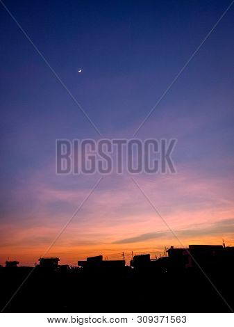 Twilight And The Moon In The Flatland Of Nepal