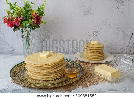 Moroccan Pancakes Baghrir Beghrir Or Crapes With 1000 Holes Served With Honey And Butter On Grey Bac