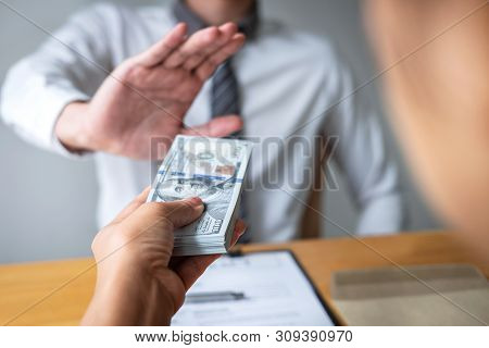 Anti Bribery And Corruption Concept, Business Man Refusing And Don't Receive Money Banknote In Envel