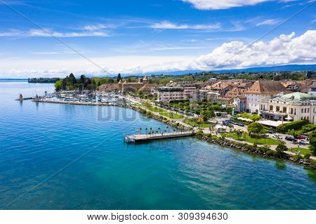Aerial View Of Morges City Waterfront In The Border Of The Leman Lake In  Switzerland